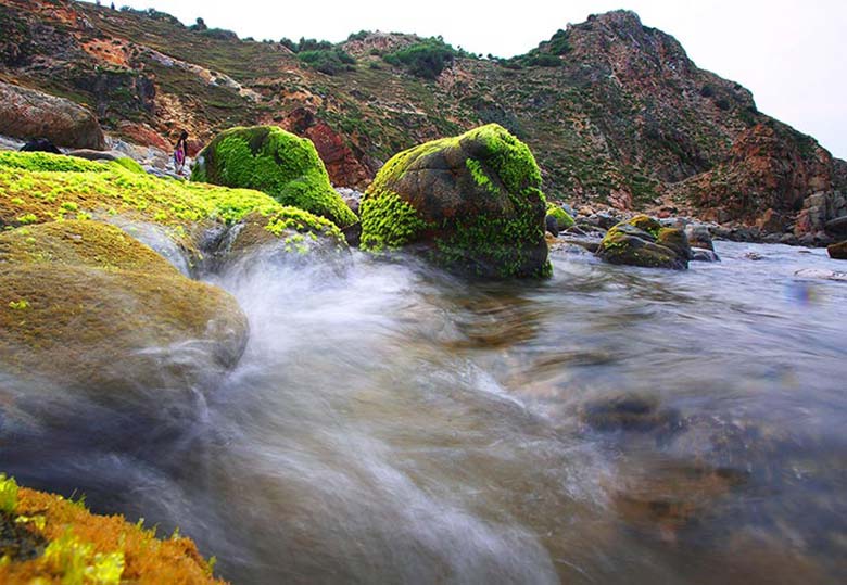 The unique moss-covered rocks of Eo Gio bay